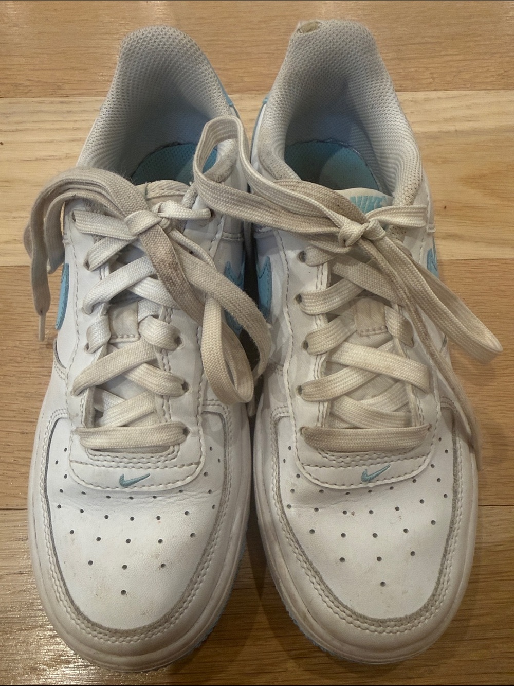 Nike Kids White Sneakers with Light Blue Swoosh